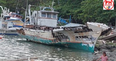 PHILIPPINEN MAGAZIN - FOTOS - Alte Fischerboote in der Tambobo Bucht