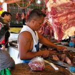 FOTO DES TAGES – Rindfleischhändler auf dem Markt