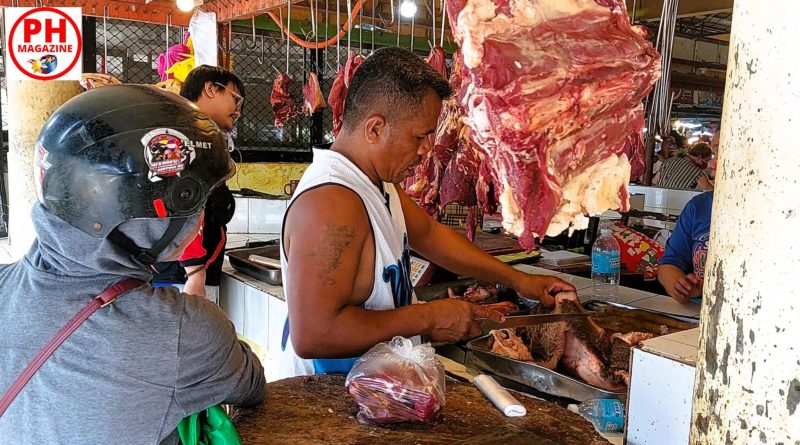 PHILIPPINEN MAGAZIN - FOTO DES TAGES - Rindfleischhändler auf dem Markt