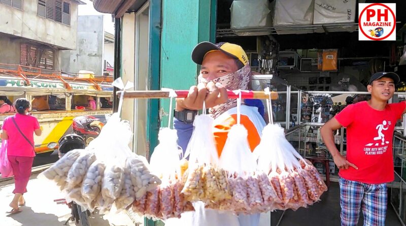 PHILIPPINEN MAGAZIN - FOTO DES TAGES - Fliegender Erdnussverkäufer